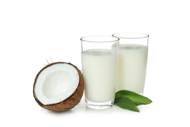 Pitcher of coconut milk isolated on white background