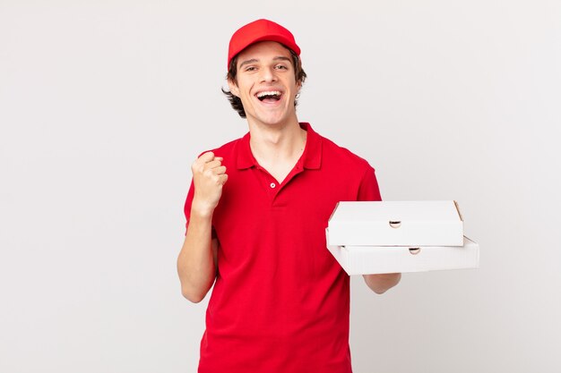 Pizza deliver man feeling shocked,laughing and celebrating success