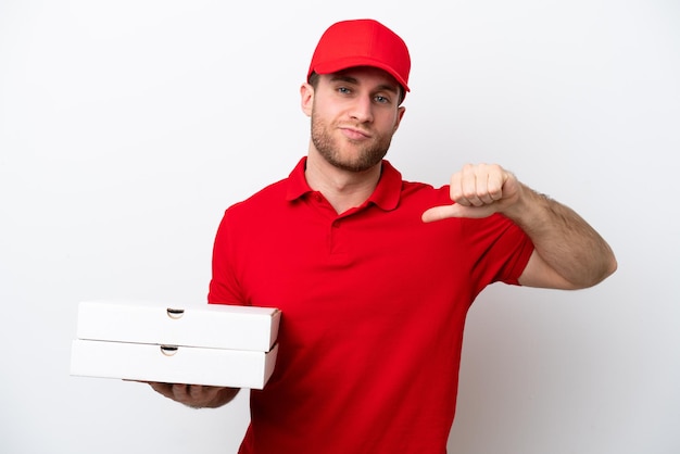 Pizza delivery caucasian man with work uniform picking up pizza boxes isolated on white background proud and selfsatisfied