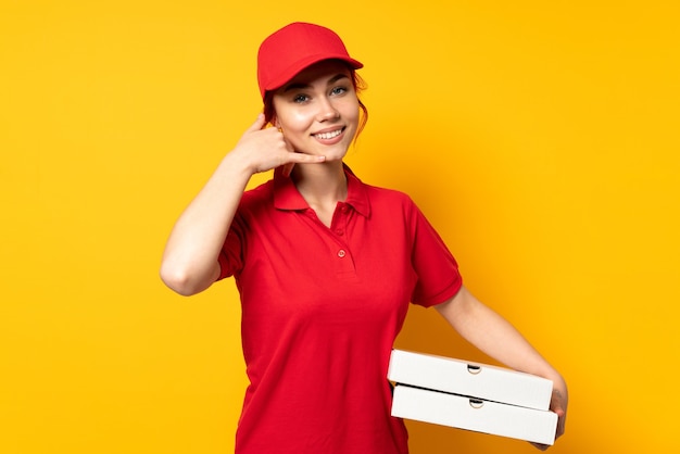 Pizza delivery girl holding a pizza