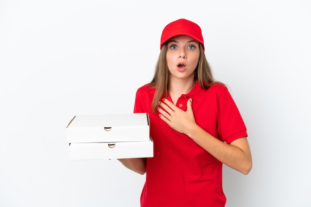 Pizza delivery Lithuanian woman isolated on white background surprised and shocked while looking right