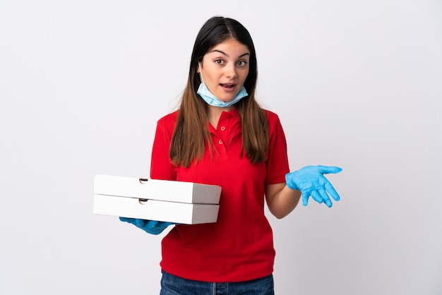 Pizza delivery woman holding pizzas