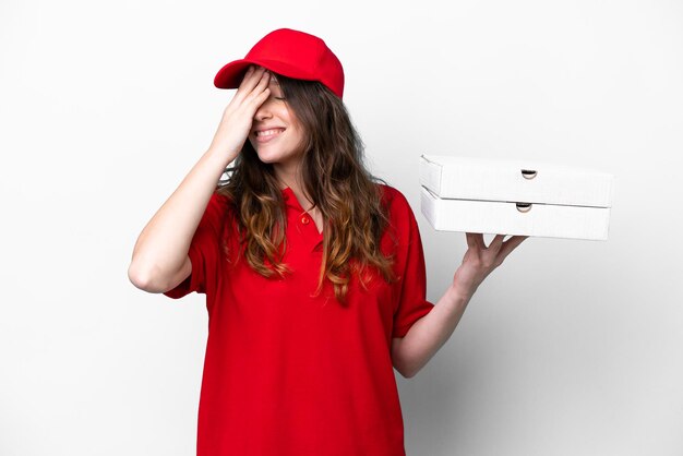 Pizza delivery woman with work uniform picking up pizza boxes isolated on white background has realized something and intending the solution