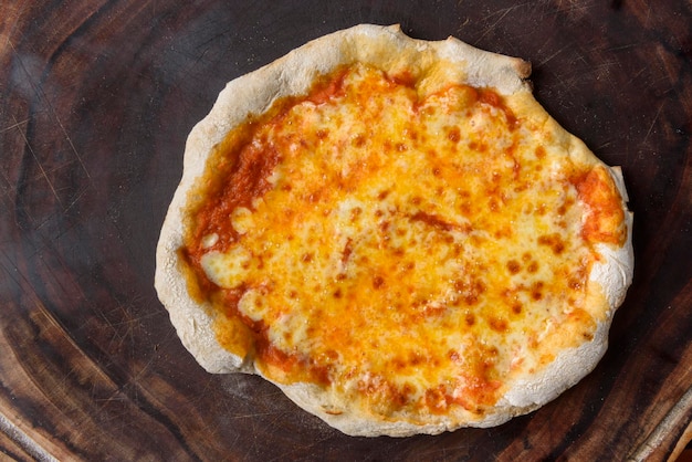 Pizza Homemade cheese pizza over wood