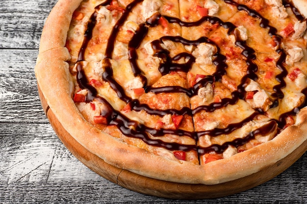 Pizza hot pizza on a white wooden background side and top view