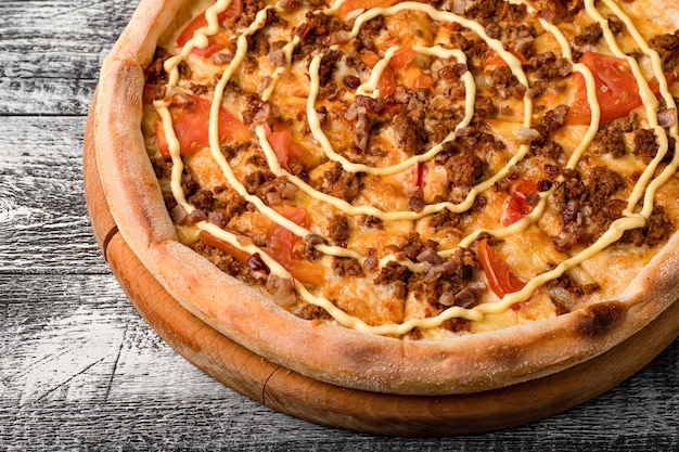 Pizza hot pizza on a white wooden background side and top view