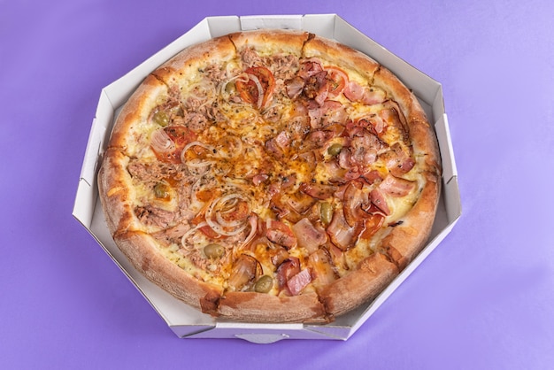 Pizza on the table in purple color