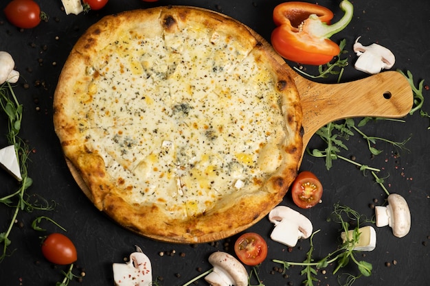 Pizza with cheese on a black background Khachapuri