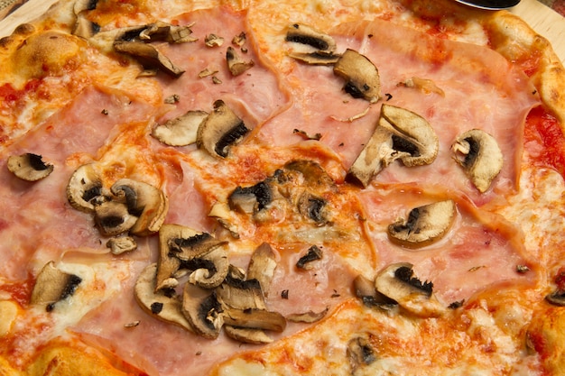 pizza with ham and mushrooms