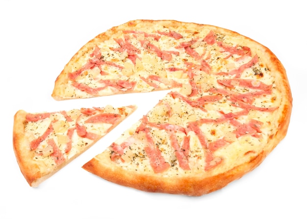 Pizza with pineapple, mozzarella and ham. A piece is cut off from pizza. White background. Isolated. Close-up.