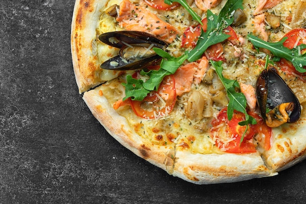 Pizza with seafood mussels shrimp salmon scallop