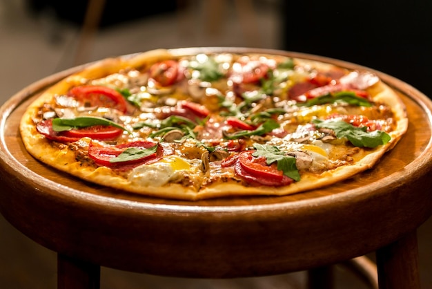 Pizza on a wooden background