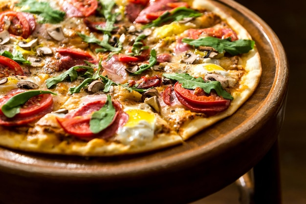 Pizza on a wooden background