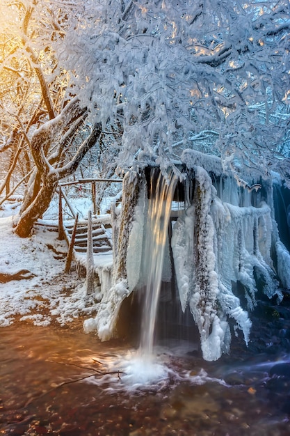 Place of summer bathing outdoors is covered with ice and frost