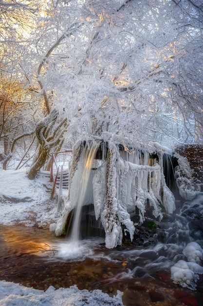 Place of summer bathing outdoors is covered with ice and frost