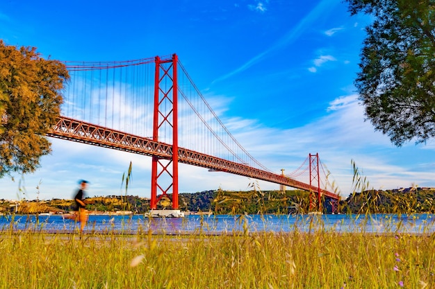 Places of interest in Lisbon Portugal Bridge of April 25 and sunset.Portuguese architecture.