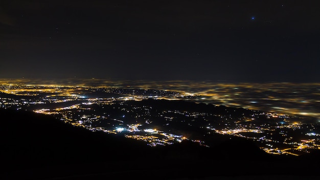 Plain illuminated partially covered by fog soft lights