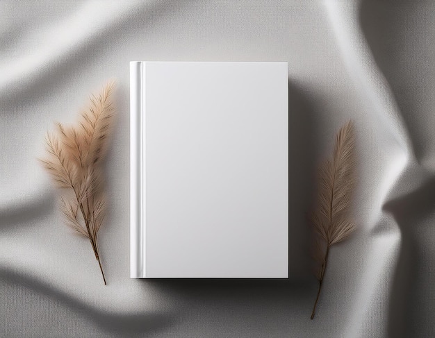 plain white book mockup on soft background