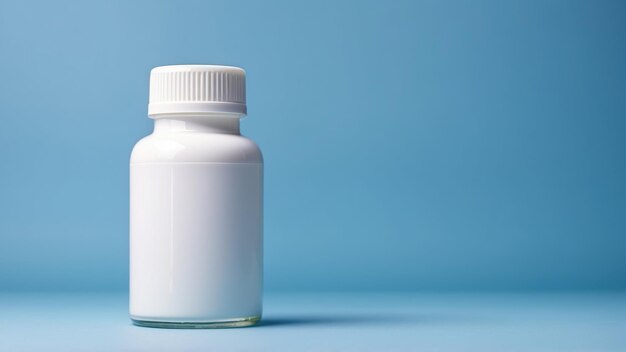 Photo plain white medicine bottle on a blue background perfect for healthcare design concepts