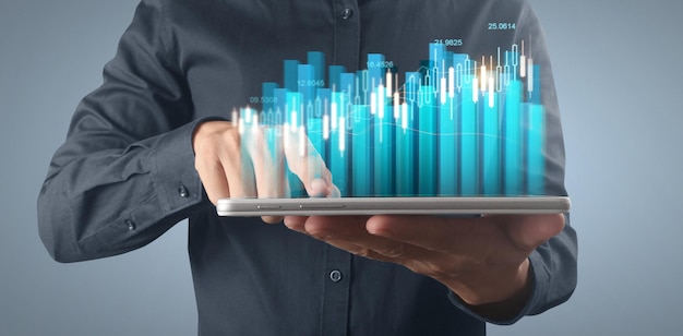 Plan graph growth and increase of chart positive indicators in his business on tablet