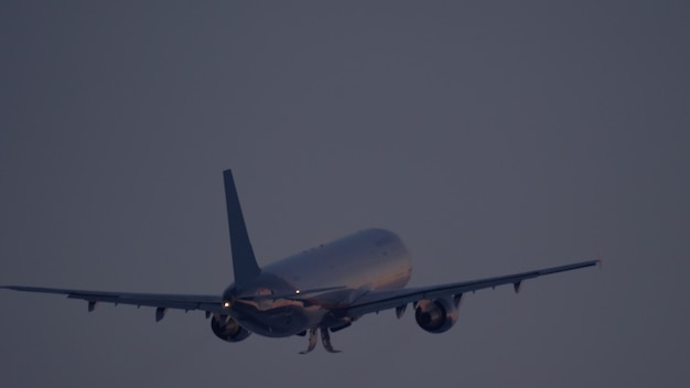 Plane closing its landing gear after take off