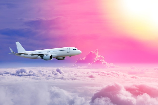 Plane in the sky Passenger commercial plane flying above the clouds concept of fast travel vacation and business