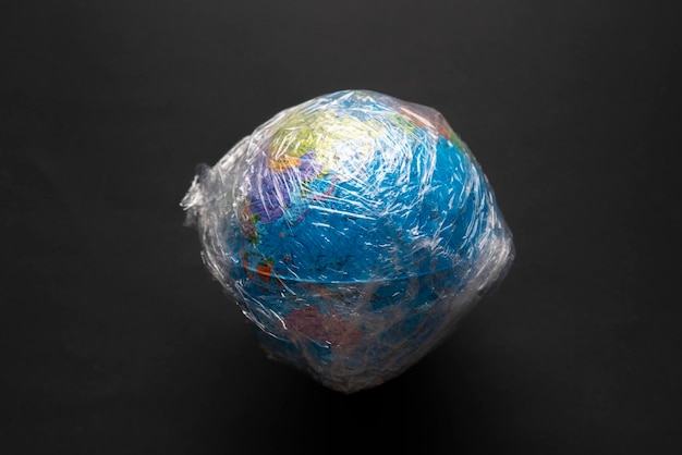 A planet earth in the plastic wrap concept of global environmental problems