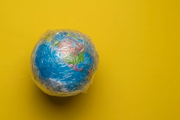 A planet earth in the plastic wrap concept of global environmental problems