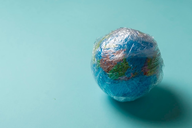 A planet earth in the plastic wrap concept of global environmental problems