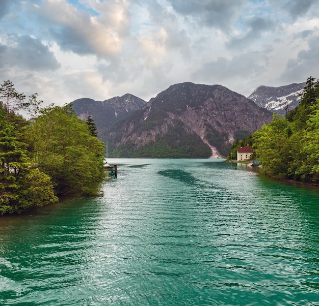 Plansee Alps mountain lake summer overcast day view Tyrol Austria