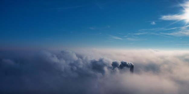 Plant pipe high above the clouds Harmful emissions into the upper atmosphere