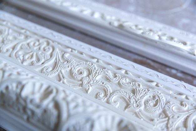 Plaster carving of an ornamental frame