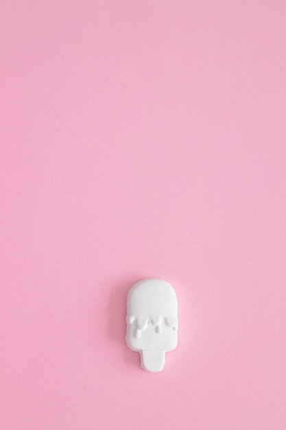 Plaster figure of ice cream on a colored background