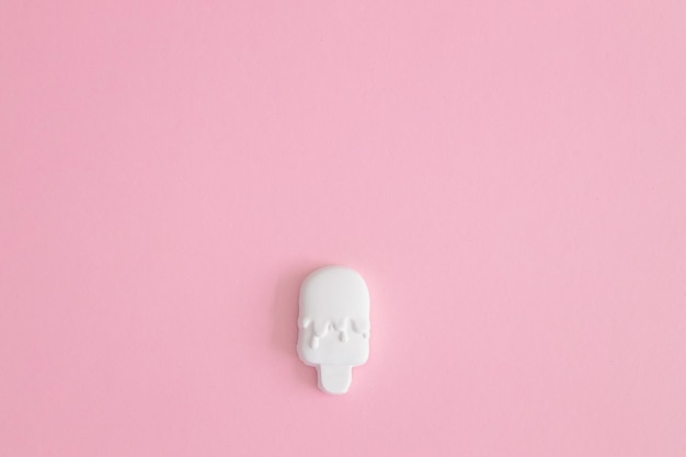 Plaster figure of ice cream on a colored background