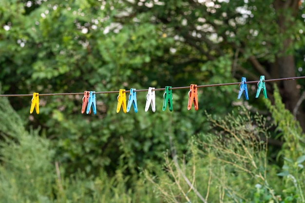 Plastic clothespins for drying clothes on a rope