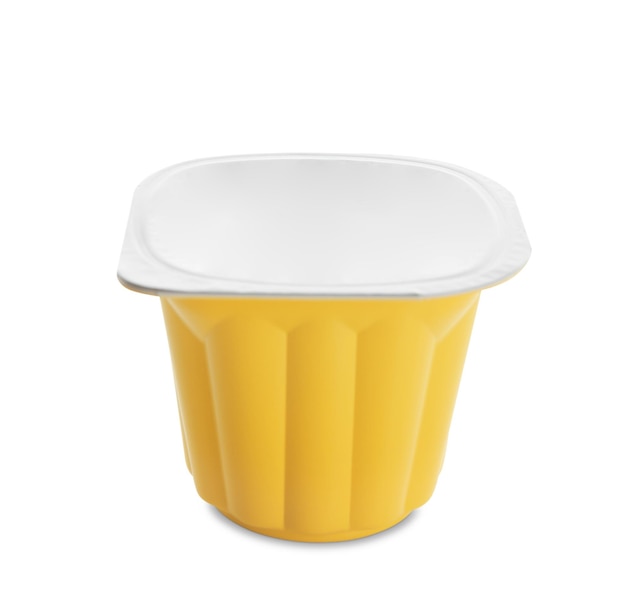 Plastic cup with fruit yogurt on white background