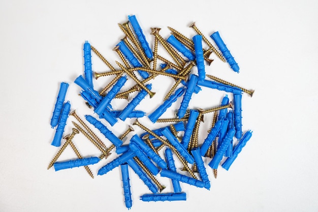 Plastic dowel pin or wall plugs on white background