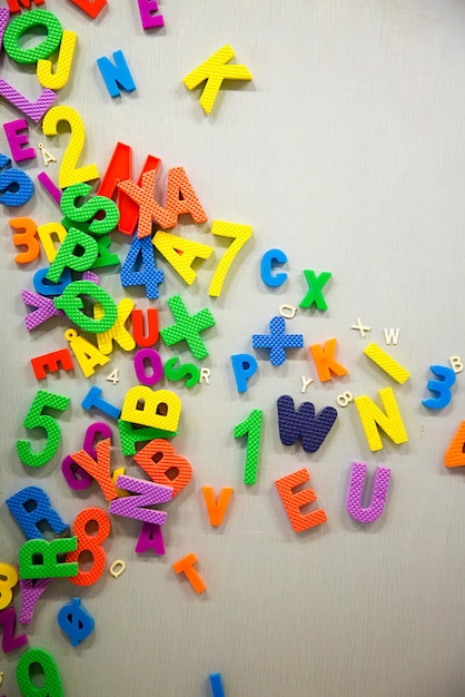 Plastic Numbers and Words Hang on Board Education Concept