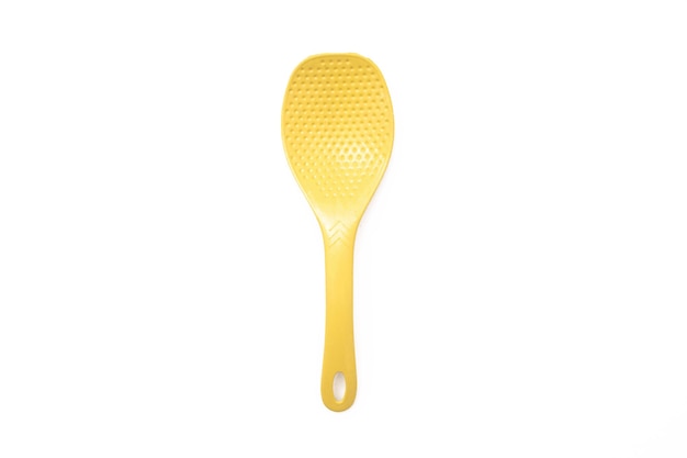 plastic rice paddle spoon isolated on a white background