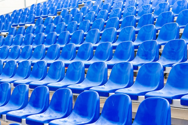 Plastic seats on stadium in summer