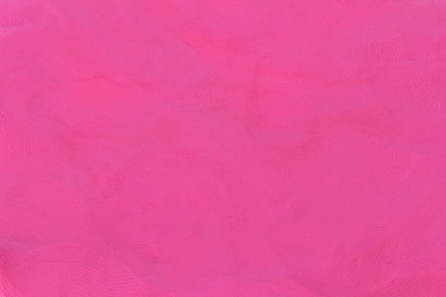 Plasticine pink textured background