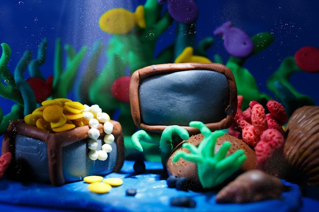 Plasticine underwater landscape  ocean and the undersea world background corals and open pirate