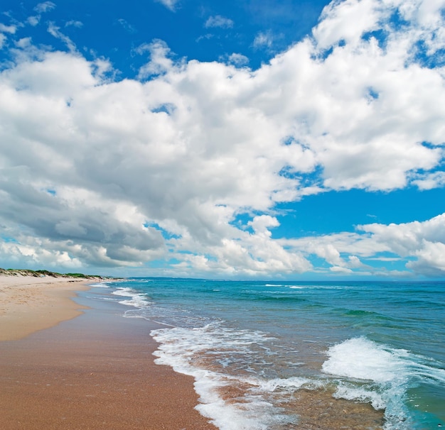 Platamona beach under a dramatic sky