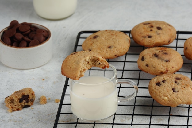 a plate of chocolate chips cookies on white background