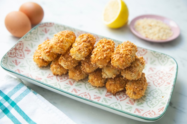 A plate of egg rolls with a plate of egg bites