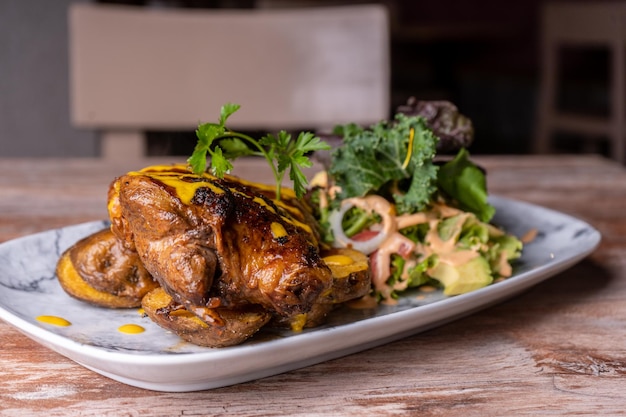 Plate of food on the table of a restaurant, typical food of Peru.