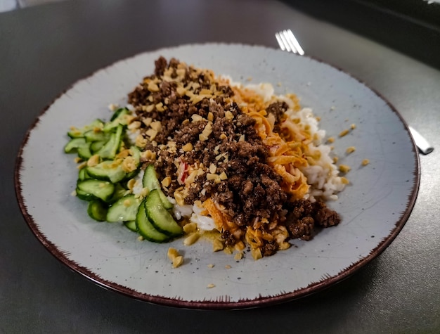 A plate of food with a plate that says'korean'on it