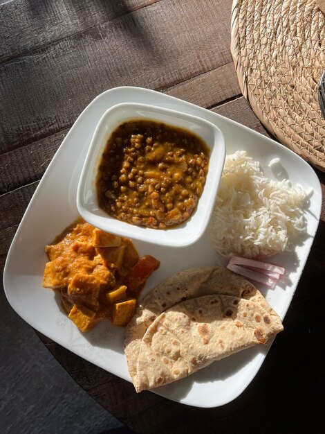 a plate of food with rice and rice on it