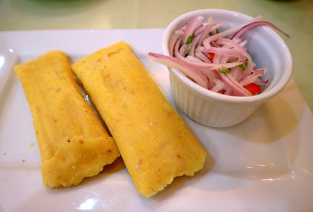 Plate of Humitas or Steamed Fresh Corn Cakes   Popular Traditional Food of the Andes Region Peru