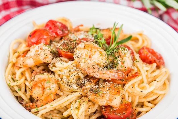 A plate of Italian Seafood shrimp noodles